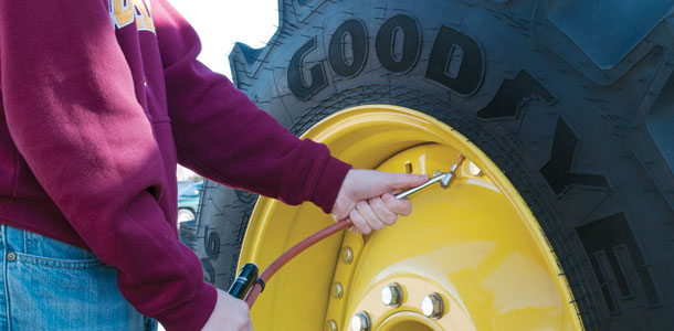 Goodyear tractor tire being inflated