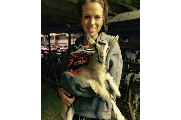 Megan Gertken holding dairy goat