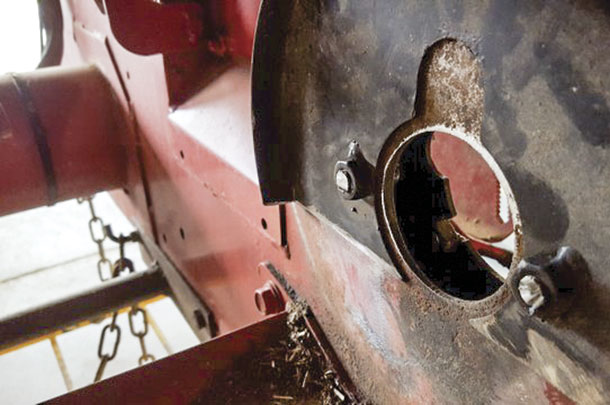 Temporarily bolt the cut anti-wrap shields to the sledge frame
