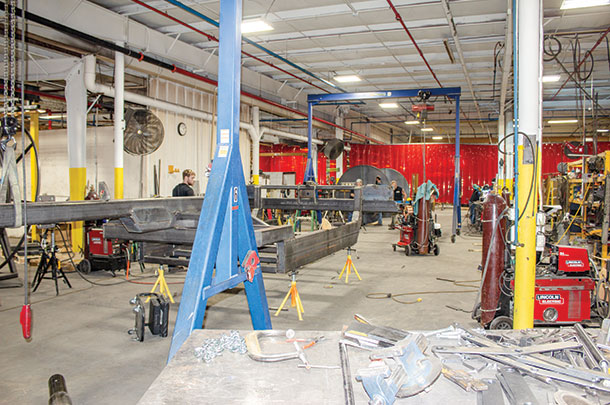 Pump trailers, hose reels and toolbars are assembled in a multitude of welding bays in the center of the facility