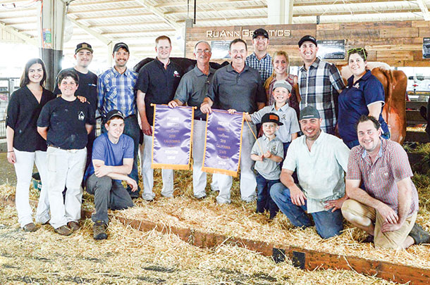 The RuAnn Genetics show crew proudly displays top honors at the 2019 California State Holstein Show