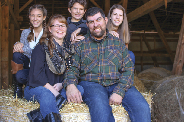Shelby and Rich Holsopple have chosen to raise their three children on their dairy farm. 