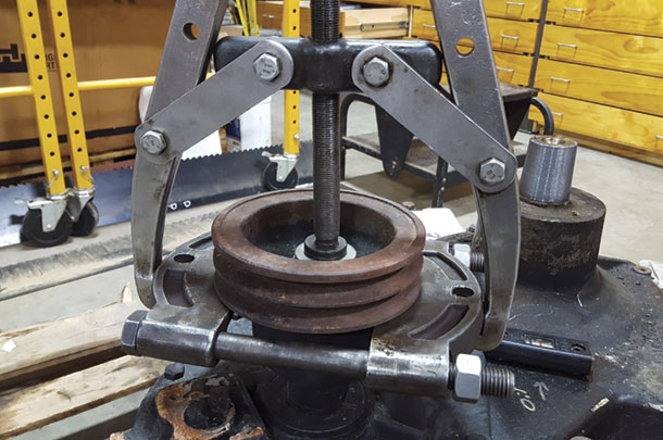 The pulley is machined from a block of steel
